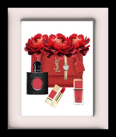 Red handbag with peonies, lipstick, blush, and a watch arranged stylishly.