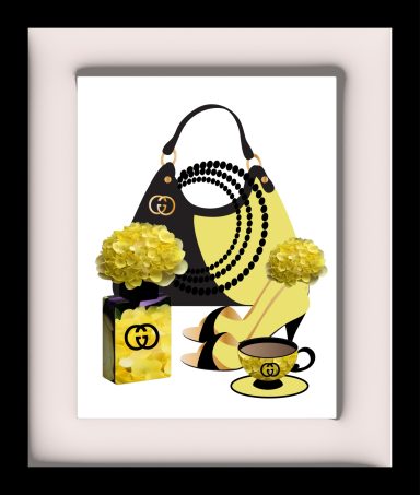 Black and yellow handbag with decorative flowers and a cup on a matching saucer.